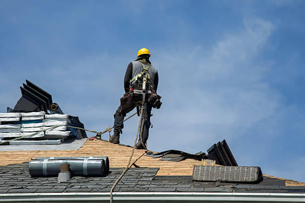 Professional Storm Damage Roof Repair technician working in Bangor, MI